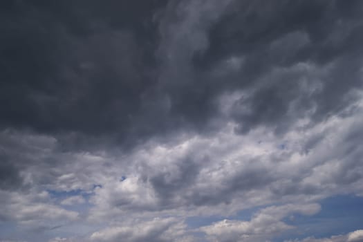 dramatic sky with cumulus clouds for use as background