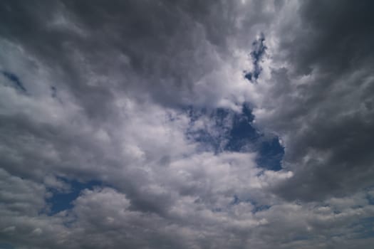 dramatic sky with cumulus clouds for use as background