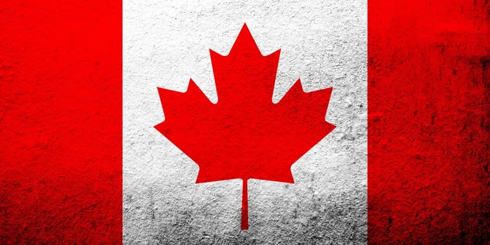 National flag of Canada Maple Leaf.  Grunge background