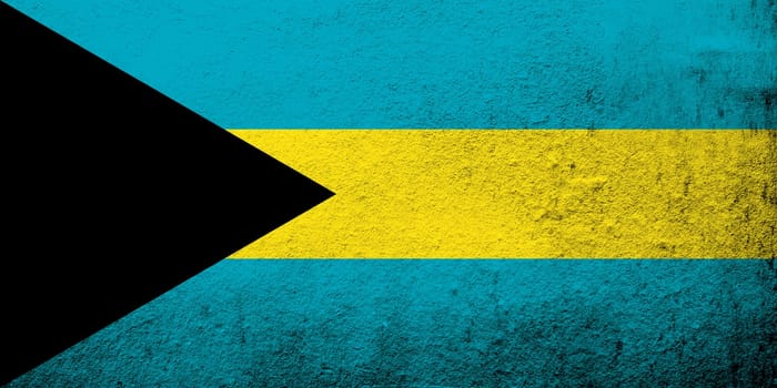 The Commonwealth of The Bahamas national flag. Grunge background
