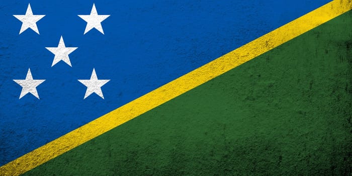 National flag of The Solomon Islands. Grunge background