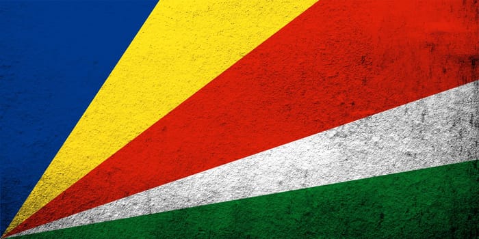 The Republic of Seychelles National flag. Grunge background