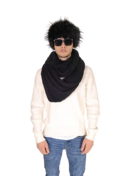 A handsome young man standing with a black fur hat and scarf and.white sweater, wearing sunglasses, isolated for white background.