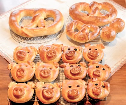 German Pretzels and Christmas cookies in the form of a pig's face as fortune cookies - lard cookies