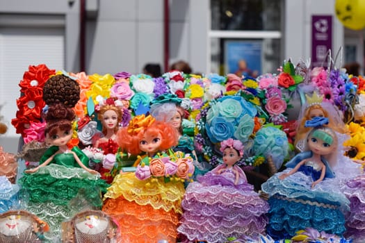 Krasnodar, Russia - May 1, 2019: Dolls girls in multi-colored dress. Dolls girls in multi colored dress
