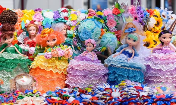 Krasnodar, Russia - May 1, 2019: Dolls girls in multi-colored dress. Dolls girls in multi colored dress