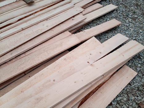 Boards with a sawmill. Building material from wood, boards for construction.