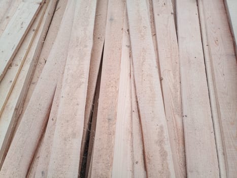 Boards with a sawmill. Building material from wood, boards for construction.