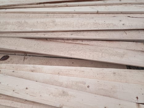 Boards with a sawmill. Building material from wood, boards for construction.