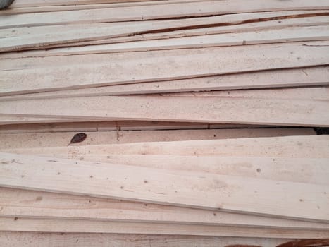 Boards with a sawmill. Building material from wood, boards for construction.