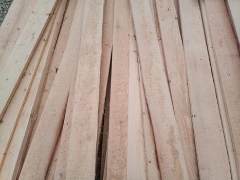 Boards with a sawmill. Building material from wood, boards for construction.