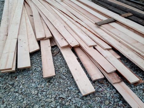 Boards with a sawmill. Building material from wood, boards for construction.