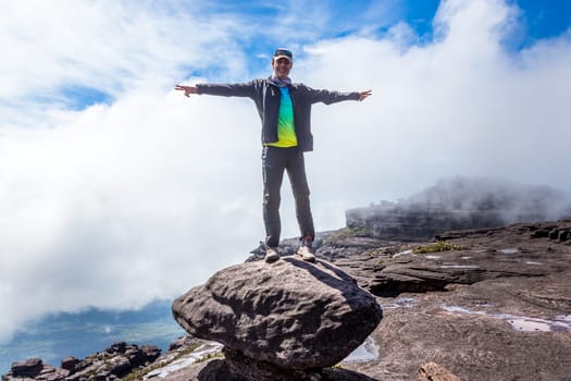 Man with open arms. Mount Roraima, Venezuela.