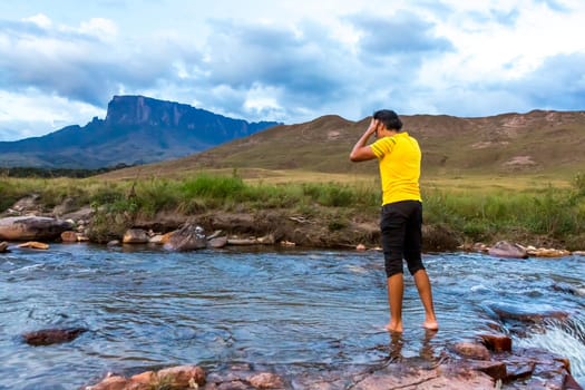 Man relaxing in nature. Mount Roaima, Venezuela.