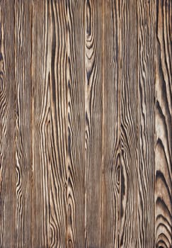Old wood brown burned plank board of pine tree, texture and background