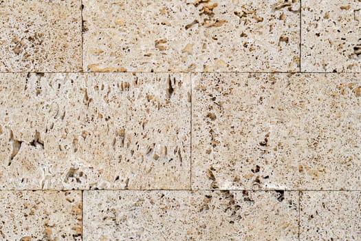 External wall made from big blocks of limestone