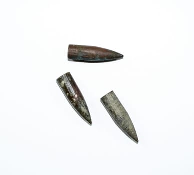 Old rusty bullets from a Kalashnikov assault rifle.