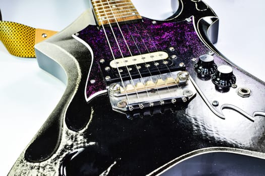 Electric guitar on a white background. A musical instrument.