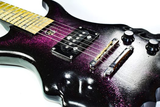 Electric guitar on a white background. A musical instrument.