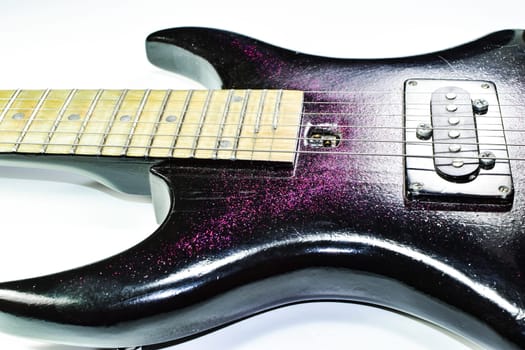 Electric guitar on a white background. A musical instrument.