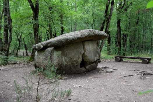 Dolmen in Shapsug. Forest in the city near the village of Shapsugskaya, the sights are dolmens and ruins of ancient civilization.
