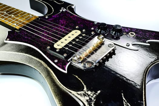 Electric guitar on a white background. A musical instrument.