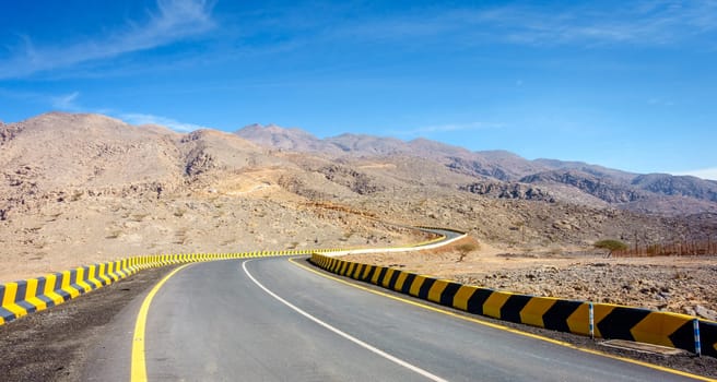 Twisty highway in Al Hajar mountains in Fujairah, UAE