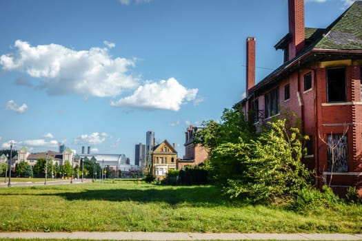 Skyscrapers of Detroit downtown are seen behind an old and neglected neighborhood