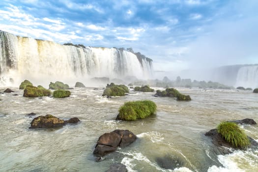 Tourists at Iguassu Falls at Iguassu National Park, World Natural Heritage Site by UNESCO