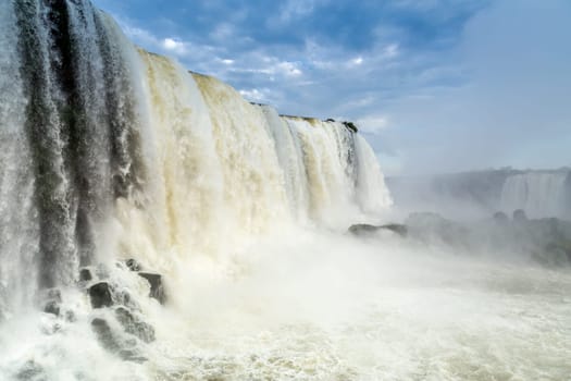 Tourists at Iguassu Falls at Iguassu National Park, World Natural Heritage Site by UNESCO