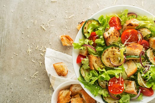 Healthy vegetable meal with roasted bread and vegetables close up