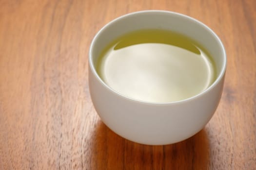 Cup of green tea close-up