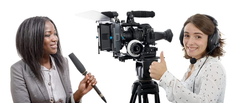two beautiful reporter women with a camera and microphone