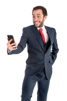 Happy businessman looking at phone, isolated in white
