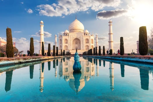Taj Mahal and its reflection, famous view of India, Agra.