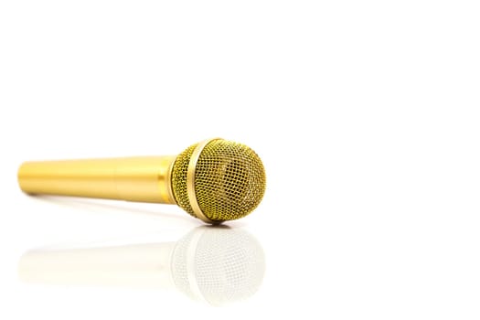 Microphone Gold on isolated white.  Entertainment and sound concept