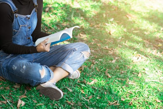 Young woman reading a book at home. Concept education