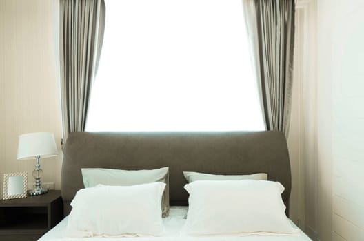 Bedroom interiors concept.  Modern bedroom style at home.