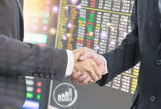 Double exposure of Business people hand shake for investment stock market concept