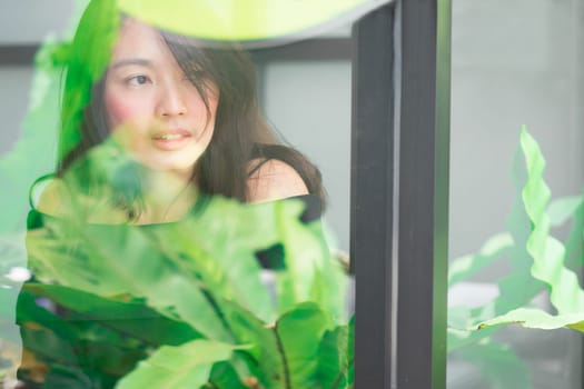 Women sitting by the window at coffee shop for relax
