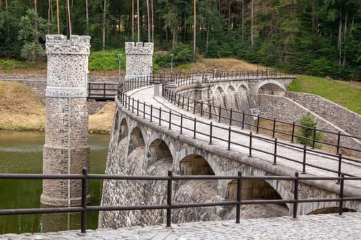 Ancient stone dam Parizov in Czech Republic, river Doubrava