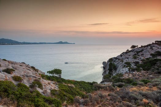 Sunrise at bay near city Kolympia, Rhodes, Greece - sunrise time