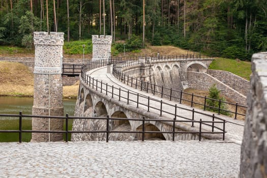 Ancient stone dam Parizov in Czech Republic, river Doubrava