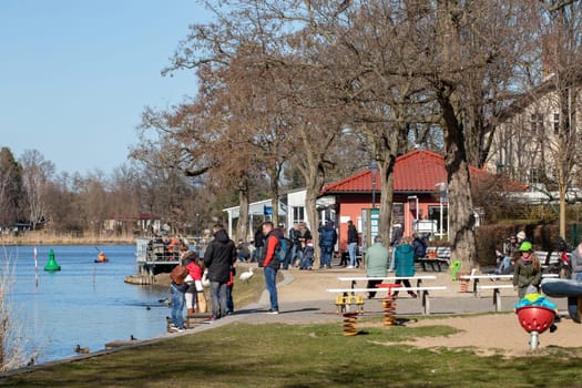 CAPUTH, Germany, Brandenburg, March 14, 2020. The most popular waterfront in Caputh at the river Havel with cable ferry port. The river Havel connects the lake Schwielow with the Templiner lake and is a popular travel destination. Macro.