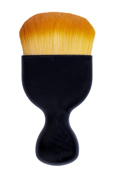 Selective focus on black clean professional makeup brush isolated on a white background. Concept beauty. Macro photograph.