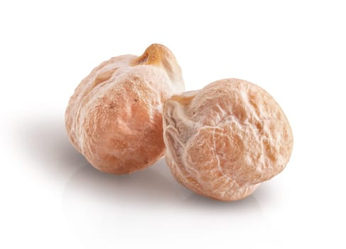 Closeup two whole dry chickpea isolated on white background