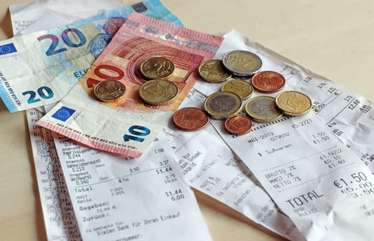 Money and bills. Cash receipt obligation in shops in Germany