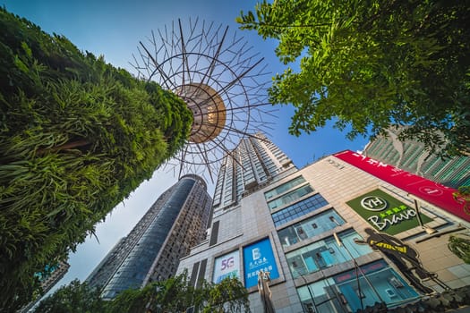 Chongqing, China -  August 2019 : Modern commercial and business skyscraper buildings containing huge shopping centre inside, the Jiefangbei district