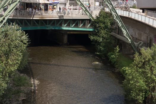 WUPPERTAL  NRW  GERMANY - JULY 31  2017:.Wuppertal  Nrw  Germany - July 31  2017:.The supporting framework of the Wuppertaler suspension railway consists of a steel framework with inclined supports and suspended steel bridges so-called Rieppelträger.