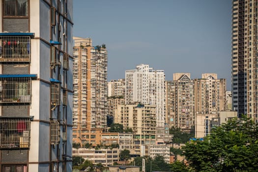 Chongqing, China -  August 2019 :  Highrise hillside residential apartments and buildings  in Chongqing city suburb